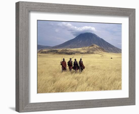 Maasai Warriors Stride across Golden Grass Plains at Foot of Ol Doinyo Lengai, 'Mountain of God'-Nigel Pavitt-Framed Photographic Print