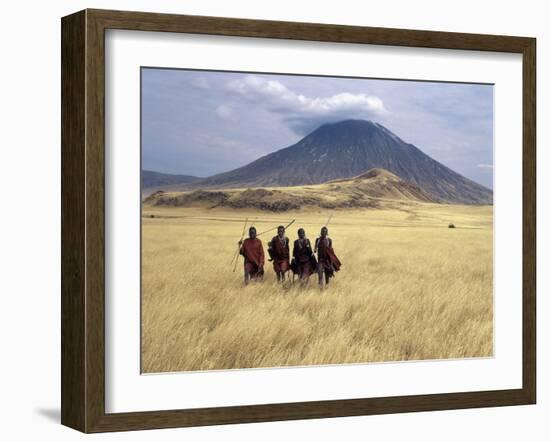 Maasai Warriors Stride across Golden Grass Plains at Foot of Ol Doinyo Lengai, 'Mountain of God'-Nigel Pavitt-Framed Photographic Print