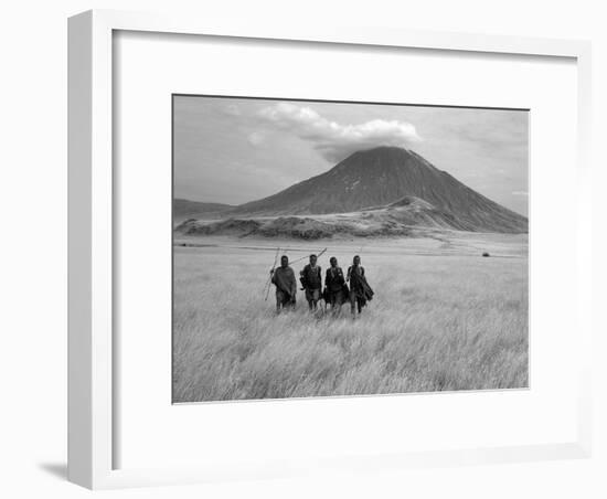 Maasai Warriors Stride across Golden Grass Plains at Foot of Ol Doinyo Lengai, 'Mountain of God'-Nigel Pavitt-Framed Photographic Print