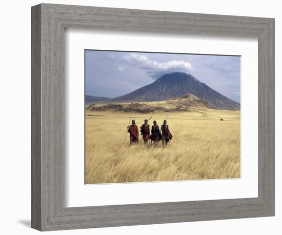 Maasai Warriors Stride across Golden Grass Plains at Foot of Ol Doinyo Lengai, 'Mountain of God'-Nigel Pavitt-Framed Photographic Print