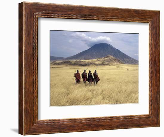 Maasai Warriors Stride across Golden Grass Plains at Foot of Ol Doinyo Lengai, 'Mountain of God'-Nigel Pavitt-Framed Photographic Print