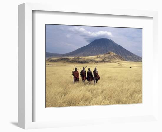 Maasai Warriors Stride across Golden Grass Plains at Foot of Ol Doinyo Lengai, 'Mountain of God'-Nigel Pavitt-Framed Photographic Print