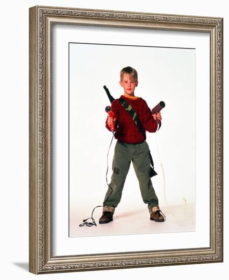 MACAULAY CULKIN. "HOME ALONE" [1990], directed by CHRIS COLUMBUS.-null-Framed Photographic Print