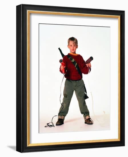 MACAULAY CULKIN. "HOME ALONE" [1990], directed by CHRIS COLUMBUS.-null-Framed Photographic Print