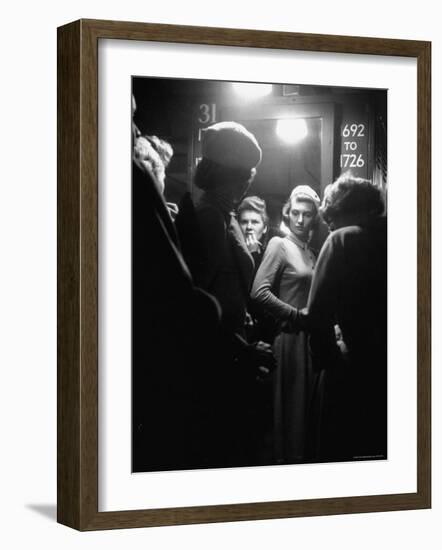 Macy's Department Store Employee Janet Steurer Preparing to Sell Costume Jewelry-Nina Leen-Framed Photographic Print