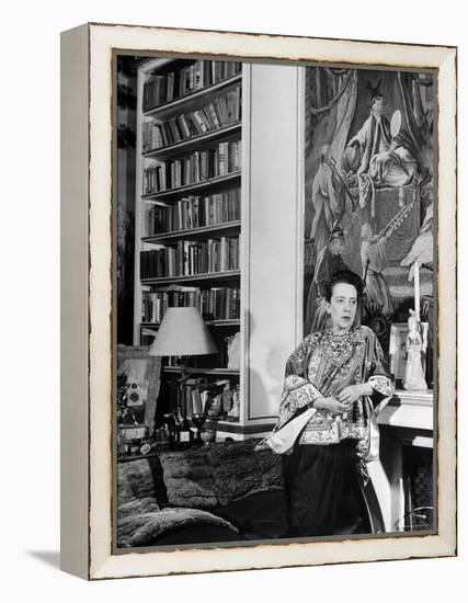 Madam Elsa Schiaparelli Enjoying Her Study Which is Filled with Treasures, Paintings, and Books-Hans Wild-Framed Premier Image Canvas