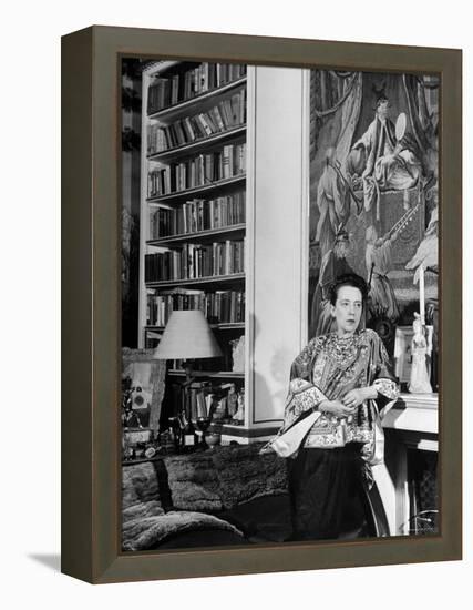 Madam Elsa Schiaparelli Enjoying Her Study Which is Filled with Treasures, Paintings, and Books-Hans Wild-Framed Premier Image Canvas