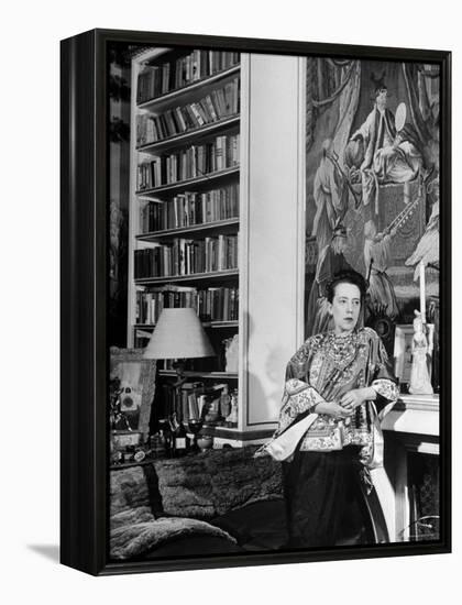 Madam Elsa Schiaparelli Enjoying Her Study Which is Filled with Treasures, Paintings, and Books-Hans Wild-Framed Premier Image Canvas