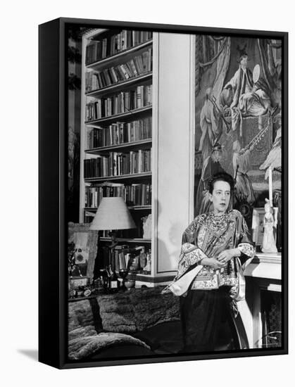 Madam Elsa Schiaparelli Enjoying Her Study Which is Filled with Treasures, Paintings, and Books-Hans Wild-Framed Premier Image Canvas