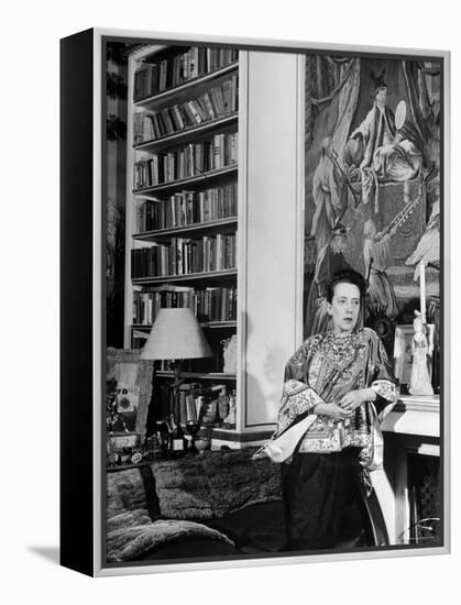 Madam Elsa Schiaparelli Enjoying Her Study Which is Filled with Treasures, Paintings, and Books-Hans Wild-Framed Premier Image Canvas