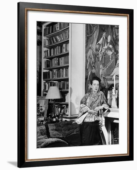Madam Elsa Schiaparelli Enjoying Her Study Which is Filled with Treasures, Paintings, and Books-Hans Wild-Framed Premium Photographic Print