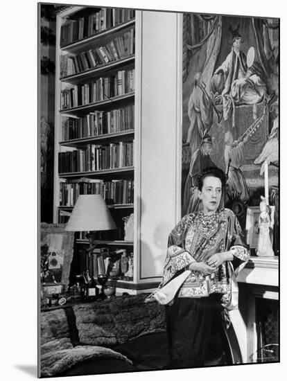 Madam Elsa Schiaparelli Enjoying Her Study Which is Filled with Treasures, Paintings, and Books-Hans Wild-Mounted Premium Photographic Print