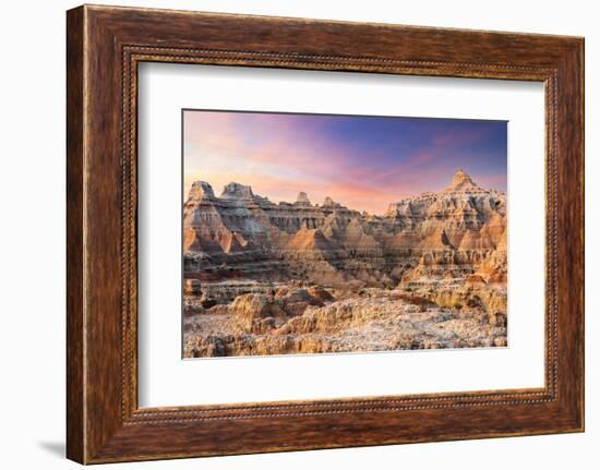 Magnificent set of striated hoodoos set against the backdrop of sunset colors in the sky.-Sheila Haddad-Framed Photographic Print