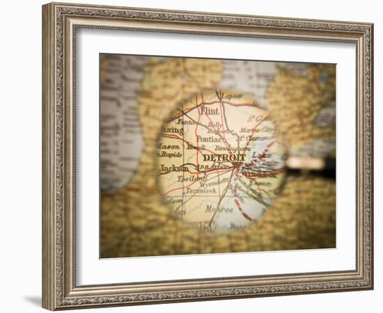 Magnifying Glass In Front Of A Detroit Map-gemenacom-Framed Art Print