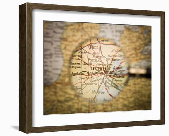 Magnifying Glass In Front Of A Detroit Map-gemenacom-Framed Art Print