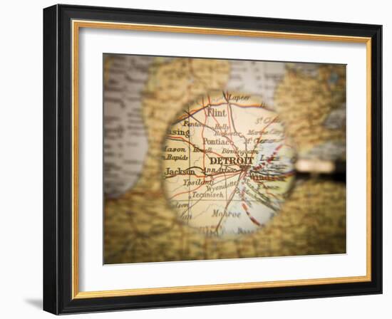 Magnifying Glass In Front Of A Detroit Map-gemenacom-Framed Art Print