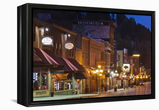 Main Street at Dusk, Deadwood, South Dakota, USA-Walter Bibikow-Framed Premier Image Canvas