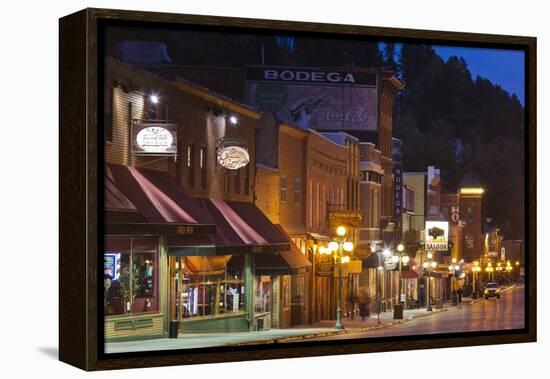 Main Street at Dusk, Deadwood, South Dakota, USA-Walter Bibikow-Framed Premier Image Canvas
