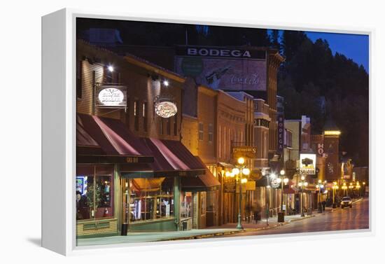 Main Street at Dusk, Deadwood, South Dakota, USA-Walter Bibikow-Framed Premier Image Canvas