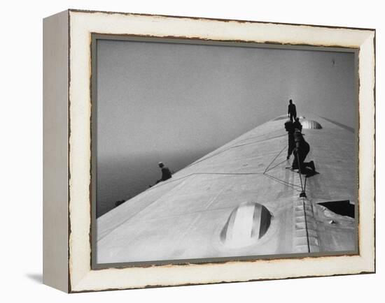 Maintenance Crewmen on Top of Graf Zeppelin repair damage caused Atlantic Ocean Storm during flight-Alfred Eisenstaedt-Framed Premier Image Canvas