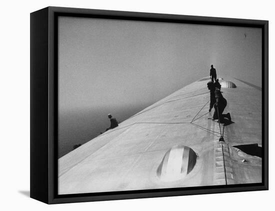 Maintenance Crewmen on Top of Graf Zeppelin repair damage caused Atlantic Ocean Storm during flight-Alfred Eisenstaedt-Framed Premier Image Canvas