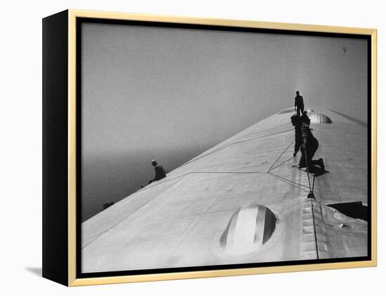 Maintenance Crewmen on Top of Graf Zeppelin repair damage caused Atlantic Ocean Storm during flight-Alfred Eisenstaedt-Framed Premier Image Canvas