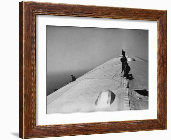 Maintenance Crewmen on Top of Graf Zeppelin repair damage caused Atlantic Ocean Storm during flight-Alfred Eisenstaedt-Framed Photographic Print