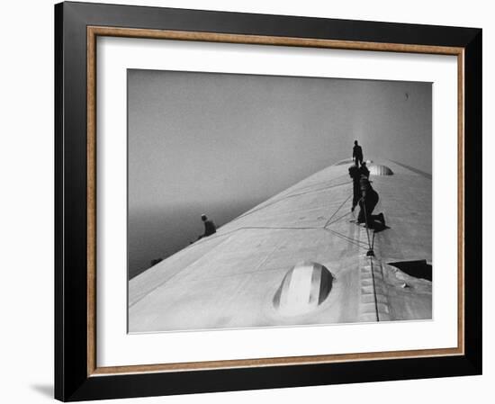 Maintenance Crewmen on Top of Graf Zeppelin repair damage caused Atlantic Ocean Storm during flight-Alfred Eisenstaedt-Framed Photographic Print