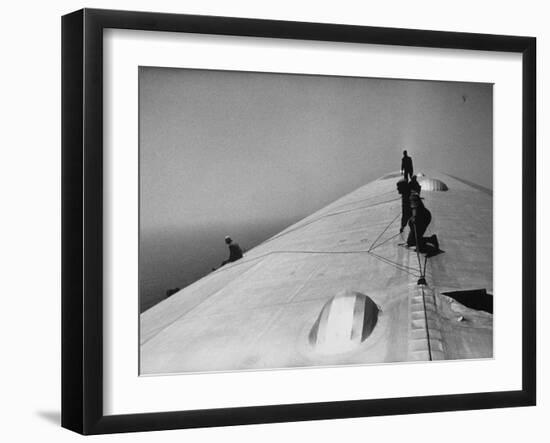 Maintenance Crewmen on Top of Graf Zeppelin repair damage caused Atlantic Ocean Storm during flight-Alfred Eisenstaedt-Framed Photographic Print