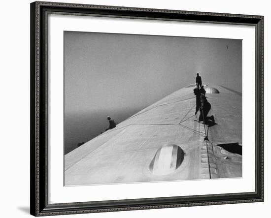 Maintenance Crewmen on Top of Graf Zeppelin repair damage caused Atlantic Ocean Storm during flight-Alfred Eisenstaedt-Framed Photographic Print