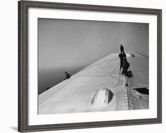 Maintenance Crewmen on Top of Graf Zeppelin repair damage caused Atlantic Ocean Storm during flight-Alfred Eisenstaedt-Framed Photographic Print