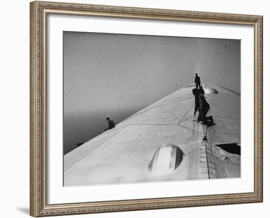 Maintenance Crewmen on Top of Graf Zeppelin repair damage caused Atlantic Ocean Storm during flight-Alfred Eisenstaedt-Framed Photographic Print