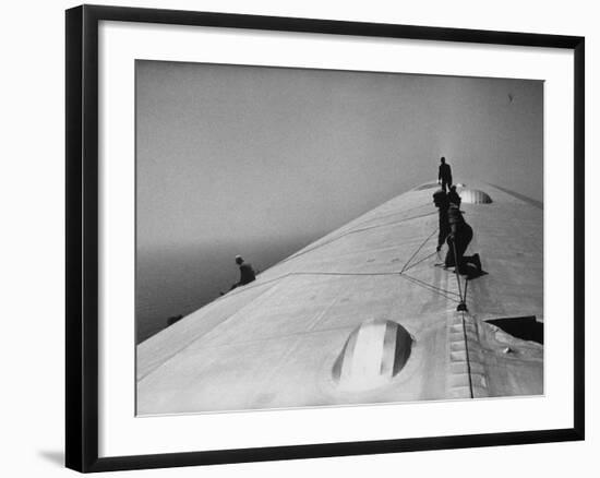 Maintenance Crewmen on Top of Graf Zeppelin repair damage caused Atlantic Ocean Storm during flight-Alfred Eisenstaedt-Framed Photographic Print