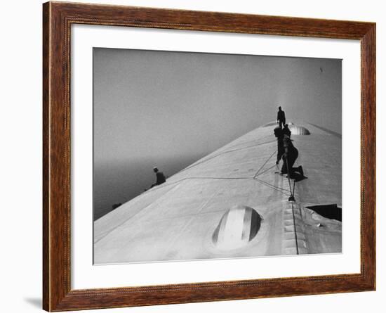 Maintenance Crewmen on Top of Graf Zeppelin repair damage caused Atlantic Ocean Storm during flight-Alfred Eisenstaedt-Framed Photographic Print