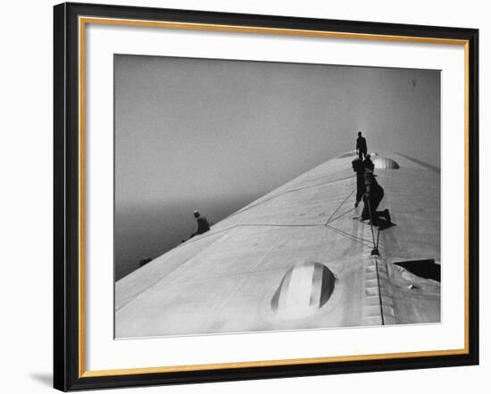 Maintenance Crewmen on Top of Graf Zeppelin repair damage caused Atlantic Ocean Storm during flight-Alfred Eisenstaedt-Framed Photographic Print