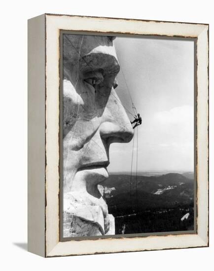 Maintenance Worker on the Nose of Mount Rushmore's Abraham Lincoln, South Dakota, 1960s-null-Framed Stretched Canvas