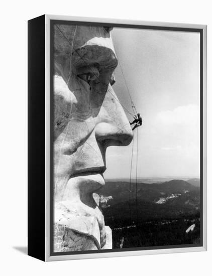 Maintenance Worker on the Nose of Mount Rushmore's Abraham Lincoln, South Dakota, 1960s-null-Framed Stretched Canvas