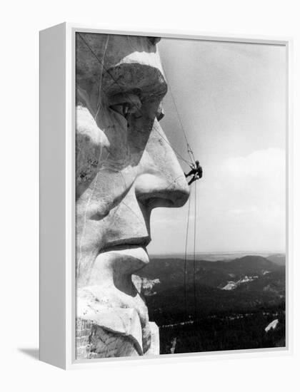 Maintenance Worker on the Nose of Mount Rushmore's Abraham Lincoln, South Dakota, 1960s-null-Framed Stretched Canvas