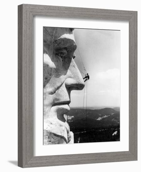 Maintenance Worker on the Nose of Mount Rushmore's Abraham Lincoln, South Dakota, 1960s-null-Framed Photo