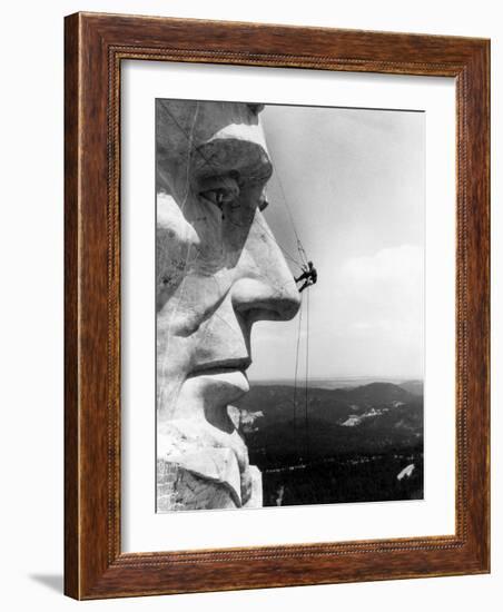 Maintenance Worker on the Nose of Mount Rushmore's Abraham Lincoln, South Dakota, 1960s-null-Framed Photo