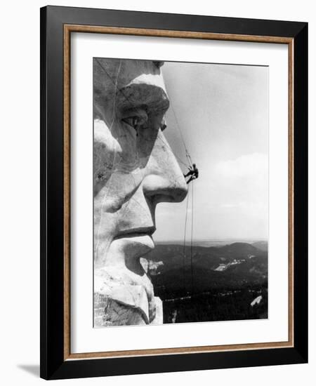 Maintenance Worker on the Nose of Mount Rushmore's Abraham Lincoln, South Dakota, 1960s-null-Framed Photo