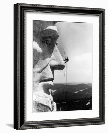 Maintenance Worker on the Nose of Mount Rushmore's Abraham Lincoln, South Dakota, 1960s-null-Framed Photo