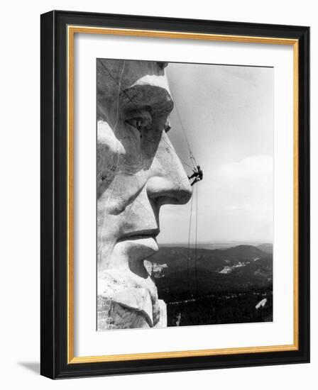 Maintenance Worker on the Nose of Mount Rushmore's Abraham Lincoln, South Dakota, 1960s-null-Framed Photo