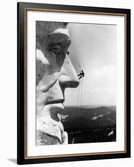 Maintenance Worker on the Nose of Mount Rushmore's Abraham Lincoln, South Dakota, 1960s-null-Framed Photo