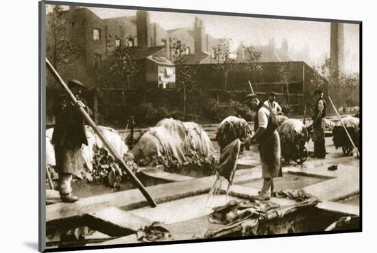 Making leather in the lime yard at Neckinger Mills, London, 20th century-Unknown-Mounted Photographic Print