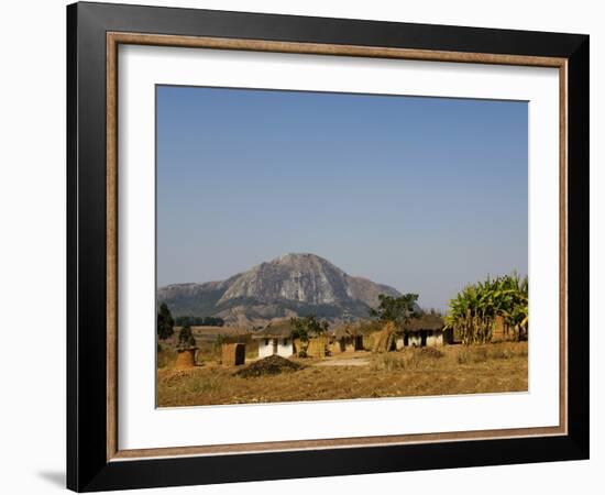 Malawi, Dedza, Grass-Roofed Houses in a Rural Village in the Dedza Region-John Warburton-lee-Framed Photographic Print