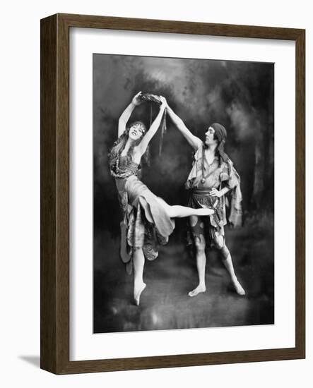 Male and Female Ballet Dancers Performing in Costume-null-Framed Photo