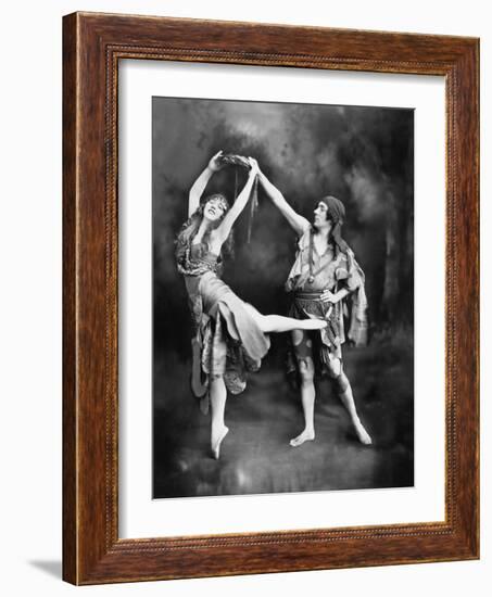 Male and Female Ballet Dancers Performing in Costume-null-Framed Photo