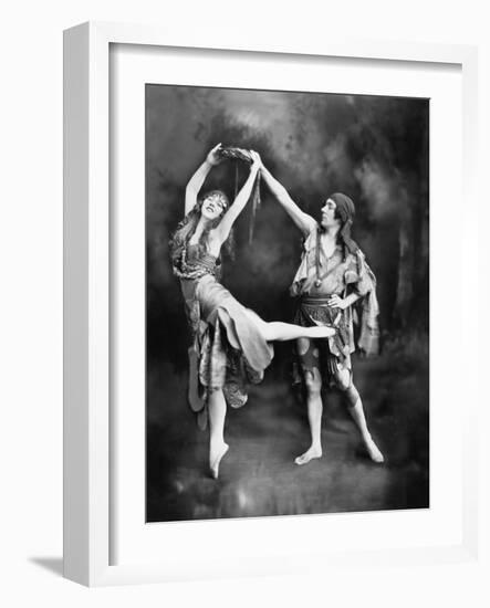 Male and Female Ballet Dancers Performing in Costume-null-Framed Photo