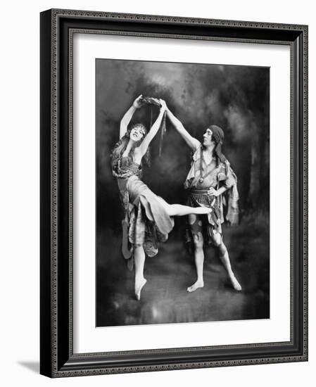 Male and Female Ballet Dancers Performing in Costume-null-Framed Photo